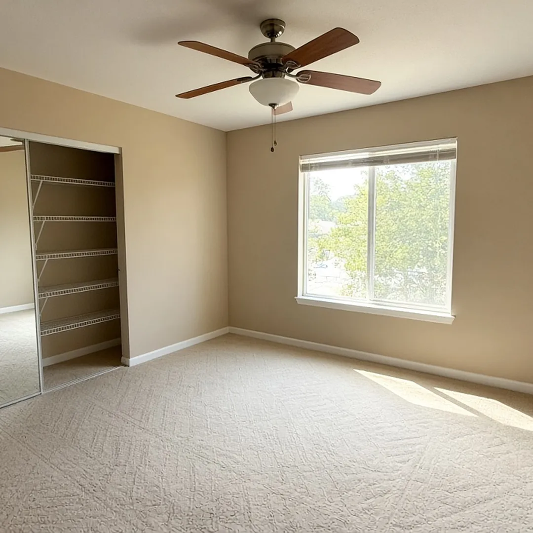 Cleared and cleaned bedroom in an Arlington home after a hoarding cleanup